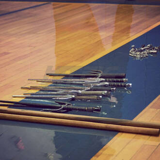 Various Martial Arts Combat Weapons Including Various Sai and Bo Staff